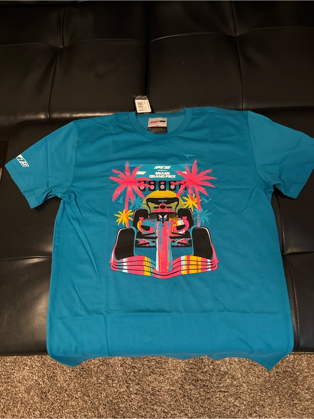 Men’s F1 Teal Racing Graphic Tee with Tropical Print